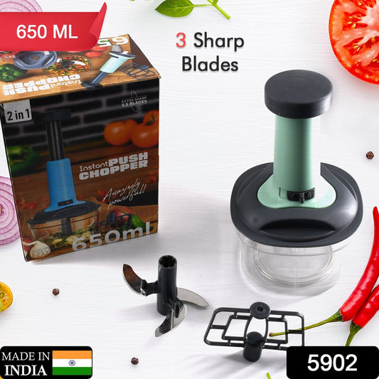 Close-up of the efficient hand push mechanism for quick vegetable chopping.