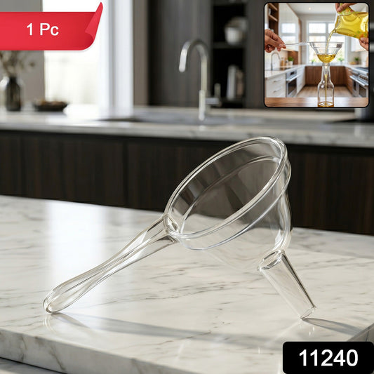 Funnel pouring grains into a container in kitchen