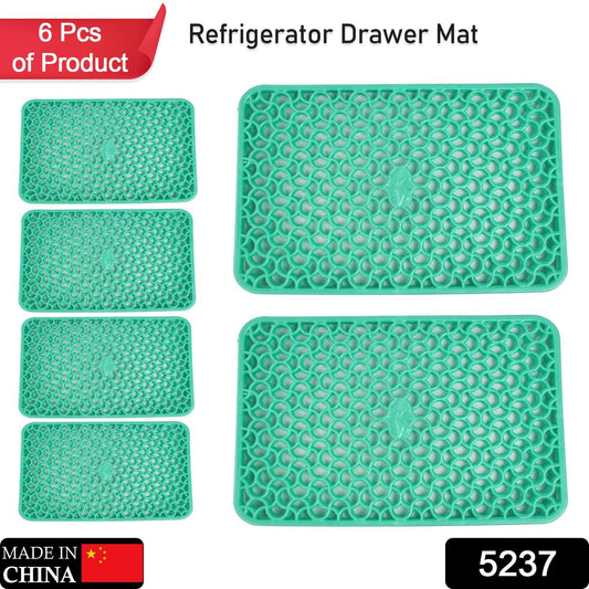 Multipurpose refrigerator liners protecting a drawer.