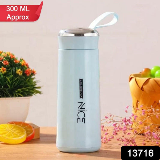 Sleek 300ml glass water bottle with a bamboo lid and carrying strap, shown in a modern setting.