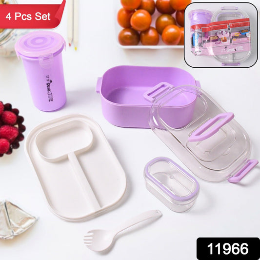 Lunch box set displaying multiple food compartments and included utensils