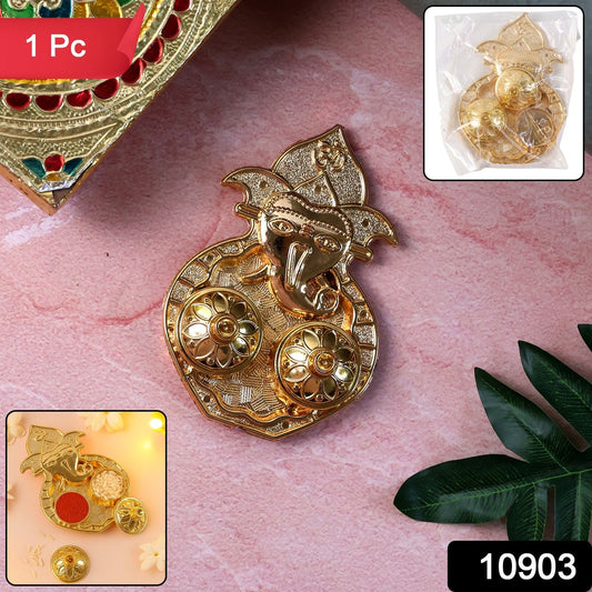 Golden kumkum stand featuring Lord Ganesha motif for pooja rituals