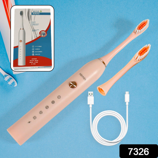 The complete BrushedUp Electric Toothbrush set, including extra brush heads and USB cable.