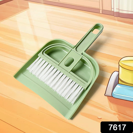 Ergonomic Mini Dustpan with Brush Set, ideal for keyboard and car cleaning.