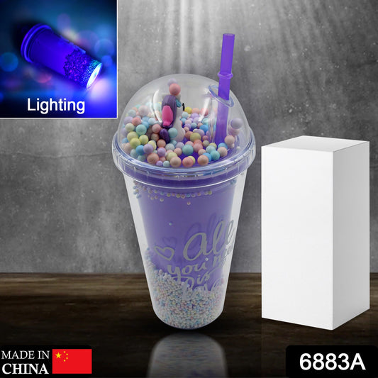 Front view of a double wall Kids LED Sipper Bottle with a toy and glowing light.