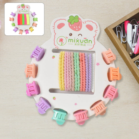 Colourful assortment of kids hair accessories, including clips and bands.