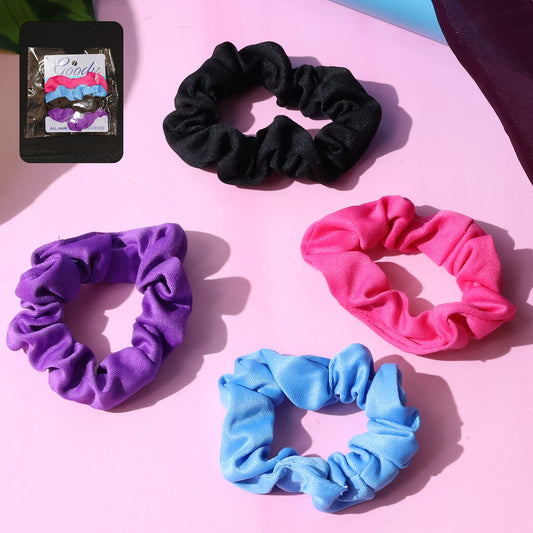 Set of four soft elastic hair scrunchies in assorted colors displayed on a white background.