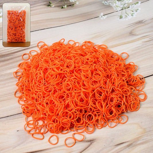Strong orange elastic rubber bands tightly bundled