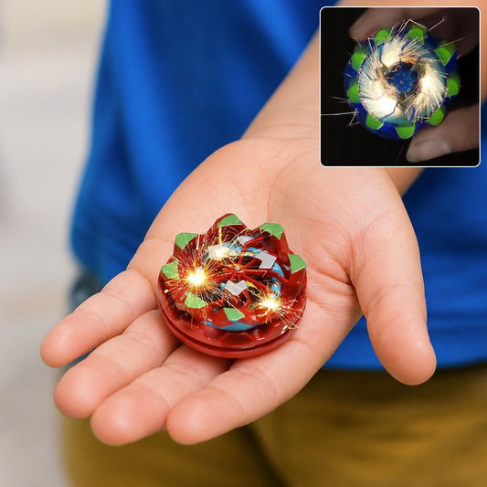 Spinning battle top toy with spark and light effects