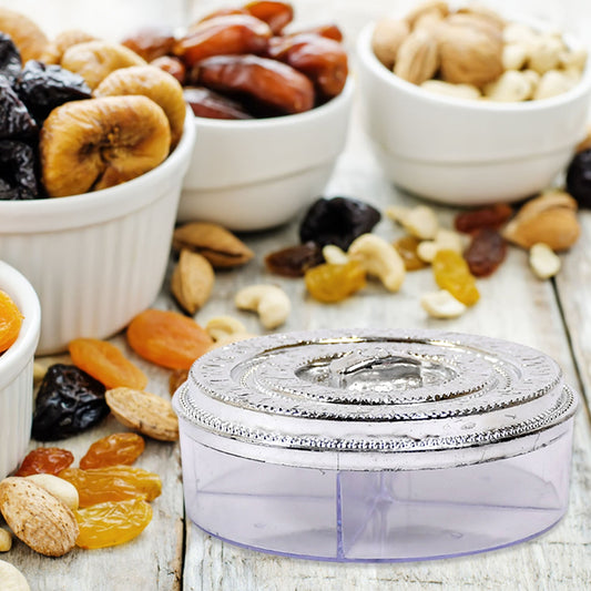 Smiling round dry fruit box with four clear compartments.