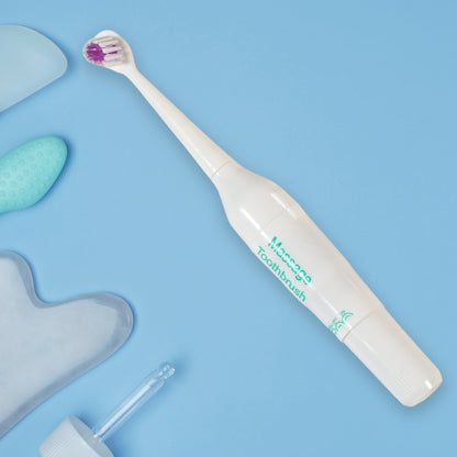 Side view of the Electric Toothbrush, showcasing its slim and lightweight design.