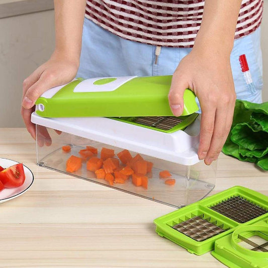 Quickslice Manual Vegetable Slicer kit displayed with various blades and container.