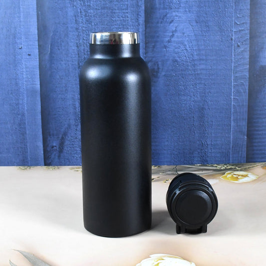 Vacuum insulated kids water bottle with stainless steel finish and colorful print