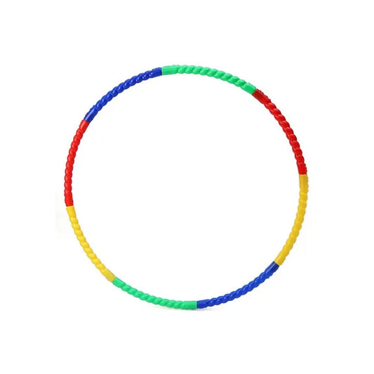 An adult using an interlocking hula hoop exercise ring for a fun home workout.