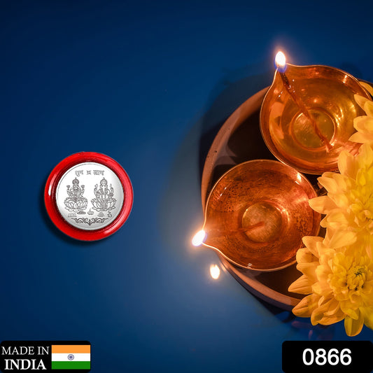 Goddess Lakshmi Pooja Coin displayed on ornate decorative surface for rituals