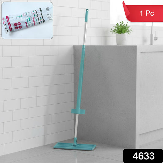 Close-up of flat floor mop's slim rectangular head cleaning tight corners