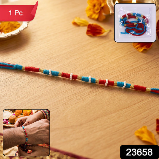 Handmade red cotton rakhi featuring pearl beads and traditional design