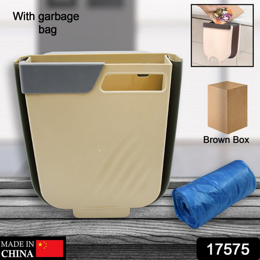 A person demonstrating the collapsible design of the space-saving waste bin.