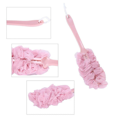 The long handle bath brush hanging in a modern bathroom, ready for use.