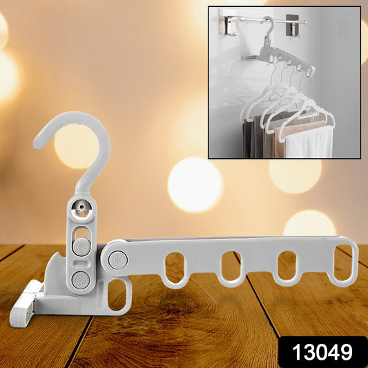 Compact folded clothes hanger, ideal for travel and space-saving storage.