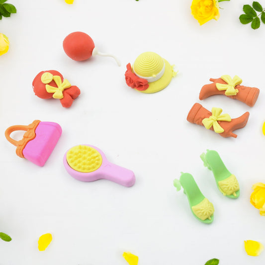 Colorful 3D mini erasers in various fun designs like animals, food, and everyday objects.