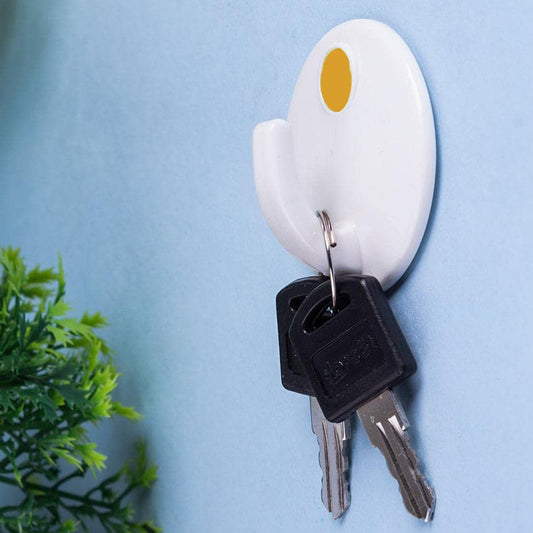 Set of three GlimmerHome self-adhesive wall hooks in a modern design, ready for home organization.
