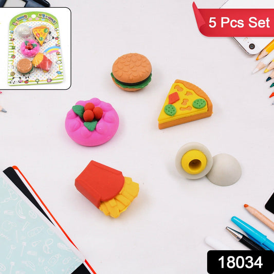 Close-up of three cute novelty erasers shaped like a burger, fries, and a hot dog.
