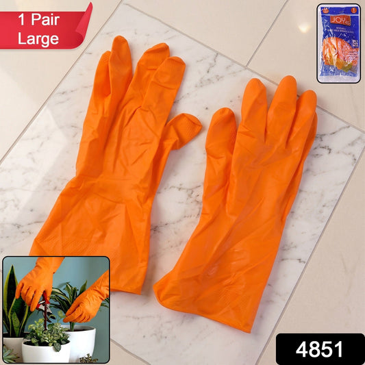 Pair of bright orange dishwashing gloves for household chores