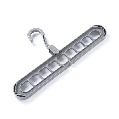 Close-up of the anti-skid plastic surface on the multi-hole clothes hanger.