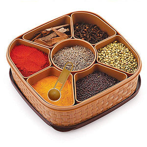 Plastic Masala Dabba with seven compartments, showcasing traditional rangoli design.