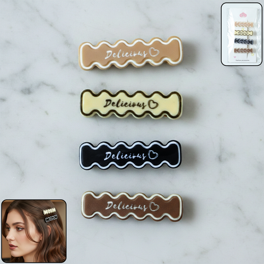 Set of four elegant design hair clips with wavy text patterns