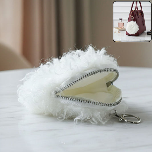 Soft fluffy mini coin purse close-up showing faux fur texture and zipper