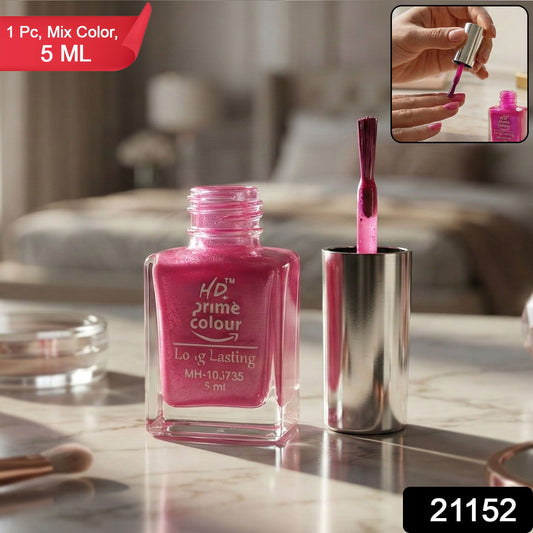 Close-up of nail colour brush and rich pigmentation of glossy nail polish