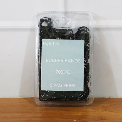 Mini rubber bands arranged to show smooth hold on hair
