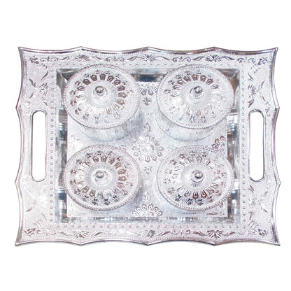 Lifestyle shot of the stylish 4-section snack storage tray with lids.
