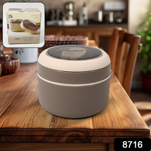 A user holding the compact leak-proof tiffin, showcasing its portable design.
