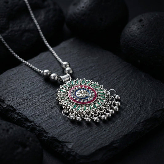 Antique silver-tone floral mandala pendant necklace with enamel accents and hanging ghungroo beads